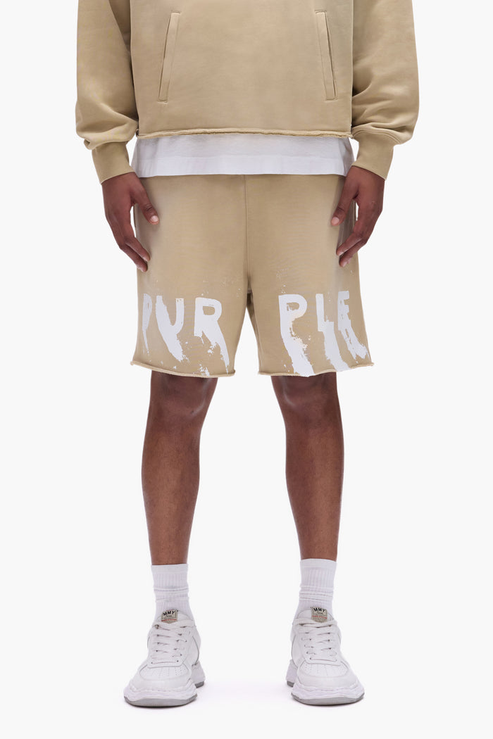 Painted Wordmark Shorts in beige, relaxed fit, 100% cotton, screen printed logo.