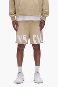 Painted Wordmark Shorts in beige, relaxed fit, 100% cotton, screen printed logo.