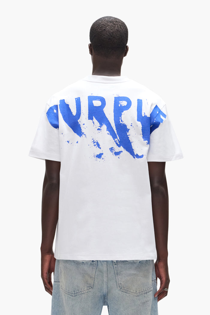 Painted Wordmark Tee in white, heavyweight jersey, featuring crackle print, available in various sizes.
