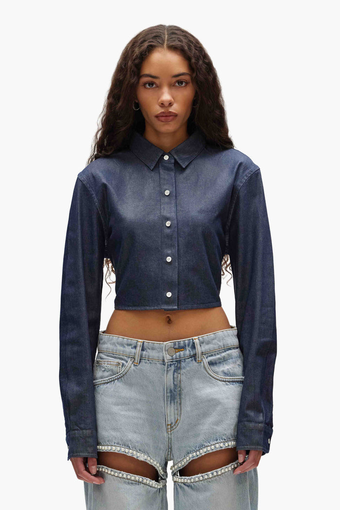 Cropped pearl button up shirt in cotton chambray with foil coating and pearl studs details.