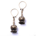 Poppy Pod Earrings from Eleven44 in brass