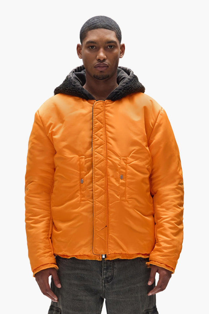Purple X Alpha Industries Bomber with a relaxed fit and sherpa lined hood, reversible design.
