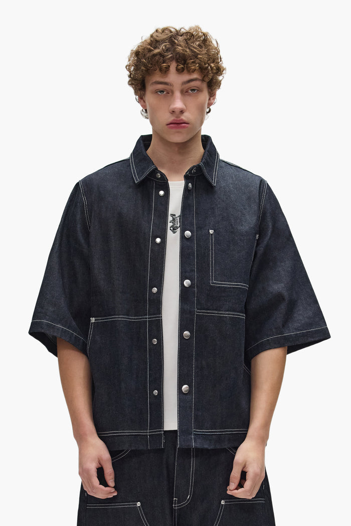 Raw Workwear Shirt oversized fit cropped length with snap front closure in raw indigo.