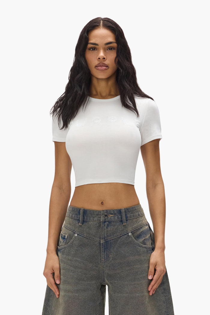 Sequin Baby Tee in slim fit featuring a ribbed soft modal fabric and sequins.