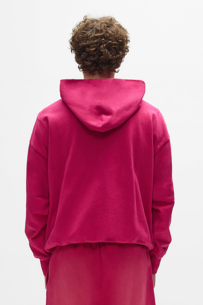 Signature Hoodie in faded wash, oversized fit, made of 100% cotton with kangaroo pocket.