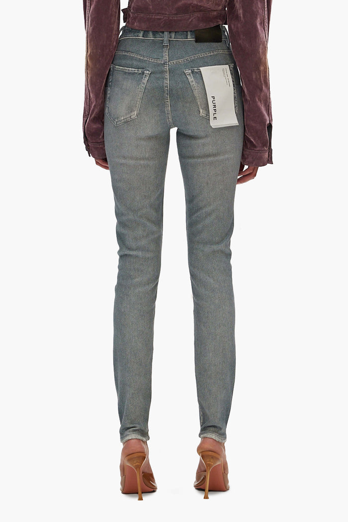 Skinny Jewel Jean in light indigo wash with jewel prints and classic five-pocket styling.
