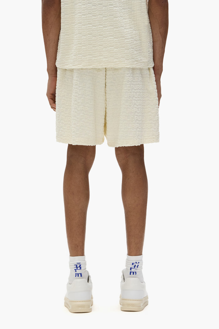 Terry Logo Shorts in tonal camo pattern with pull-on stretch waistband, regular fit.