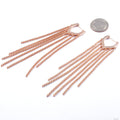 That Drip Earrings from Maya Jewelry in rose gold plated brass