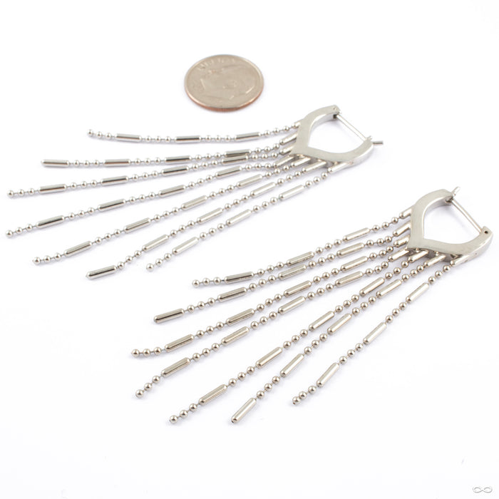 This Drip Earrings from Maya Jewelry in White Brass