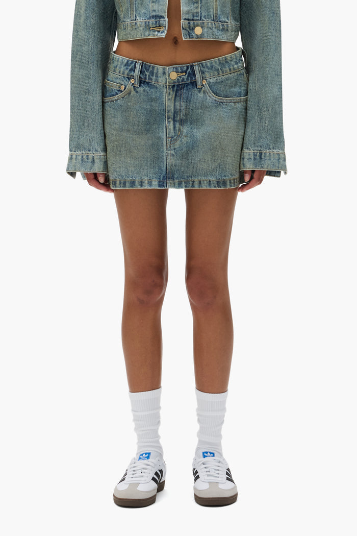 Tiled Overlay Mini Skirt with front zipper fly and 5 pocket style in various sizes.