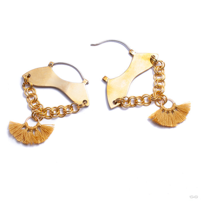 Trilogy Hoop Hybrid Earrings from Oracle with yellow tassel
