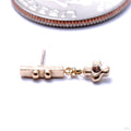 Two Dots One Bar with Drip Press-fit End in Gold from Pupil Hall with yellow sapphire