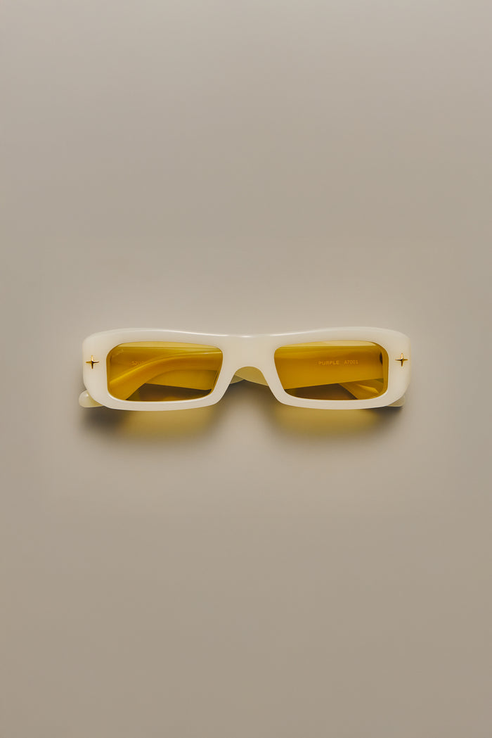 V002 Mercer sunglasses with rectangular acetate frame and brown tinted TRX lenses.