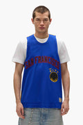 Warriors Mesh Jersey in oversized fit with embroidered fabric applique graphics.