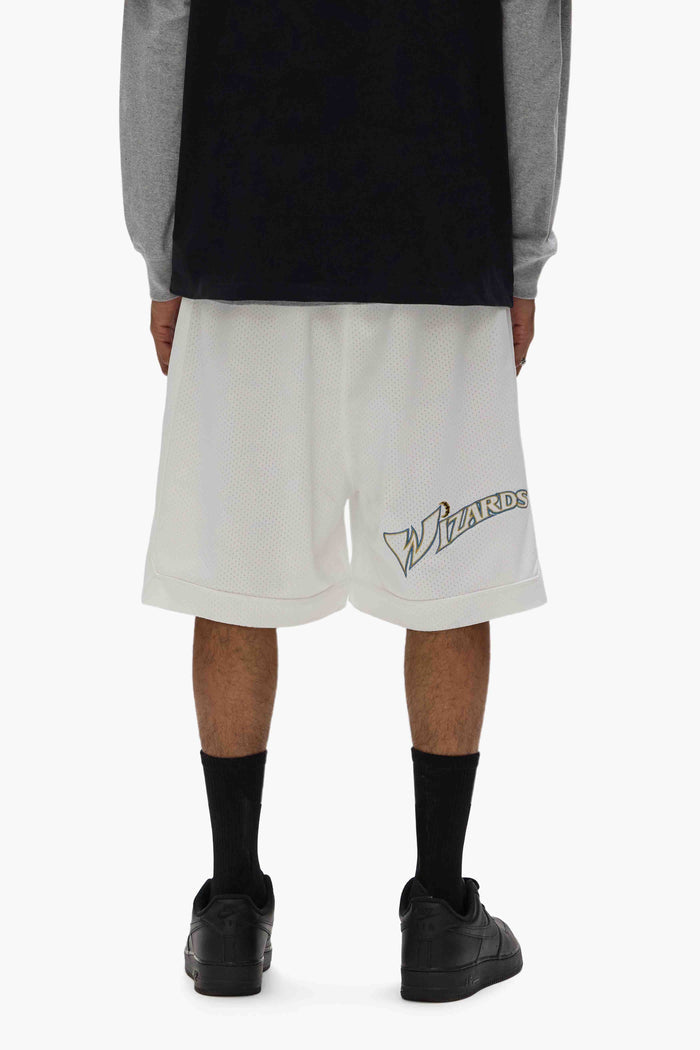 Wizards Mesh Shorts with elastic waistband, raw edge hem, and front & back fabric appliques.