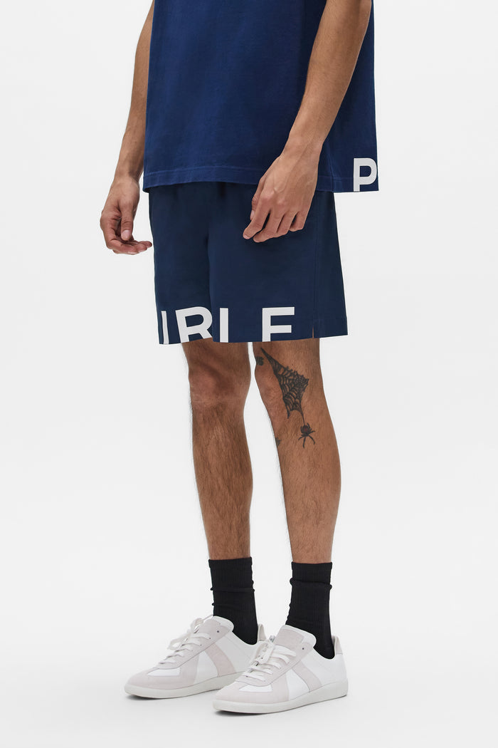 Wordmark Cut All Around Short Swimwear with elastic waistband and silicone print