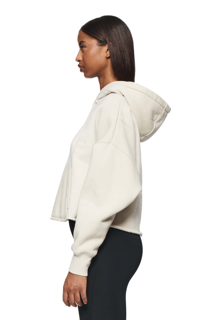 Wordmark Hoodie in heavyweight tan fleece with tonal Purple Brand logo and cropped hem.