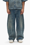Workwear Barrel Jean in Washed Indigo with barrel leg and mid-rise design. Available in multiple sizes.