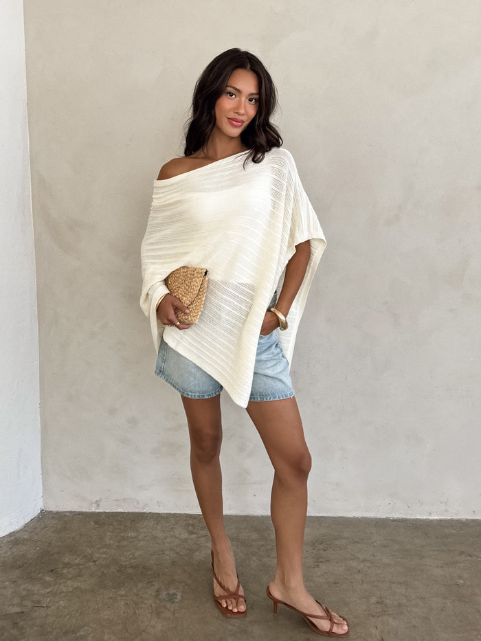 Yara Asymmetrical Knit Poncho - Stitch And Feather