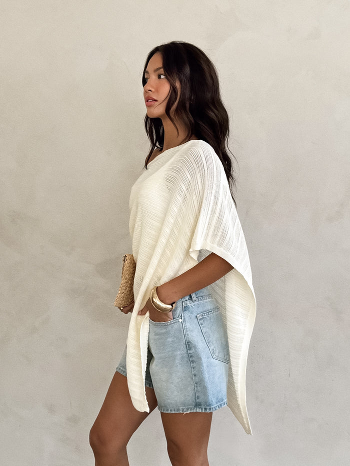 Yara Asymmetrical Knit Poncho - Stitch And Feather