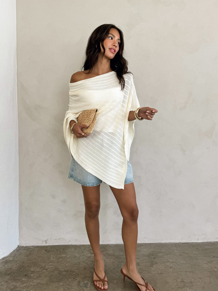 Yara Asymmetrical Knit Poncho - Stitch And Feather